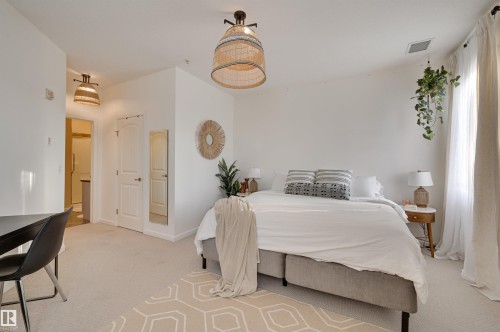 221 6083 Maynard Way, Edmonton, AB - Indoor Photo Showing Bedroom