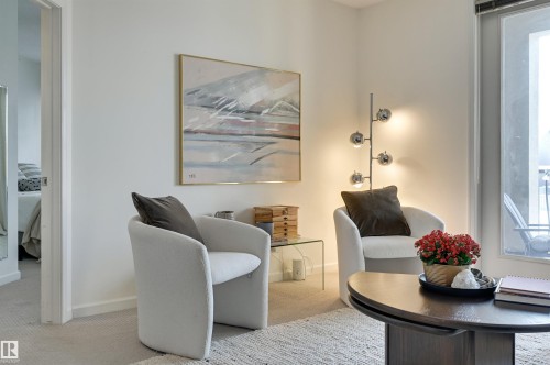 221 6083 Maynard Way, Edmonton, AB - Indoor Photo Showing Other Room