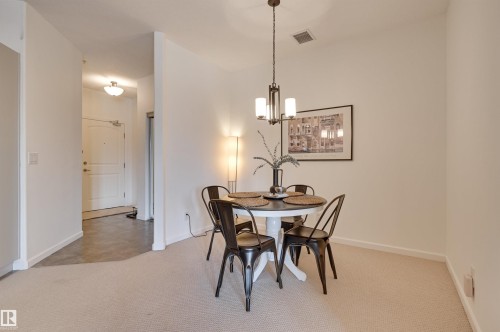221 6083 Maynard Way, Edmonton, AB - Indoor Photo Showing Dining Room