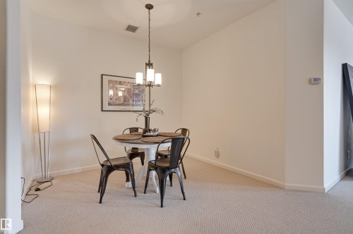 221 6083 Maynard Way, Edmonton, AB - Indoor Photo Showing Dining Room