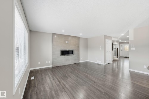 3528 Claxton Crescent, Edmonton, AB - Indoor Photo Showing Living Room With Fireplace