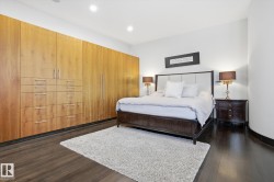 Bedroom featuring dark wood-style flooring - 