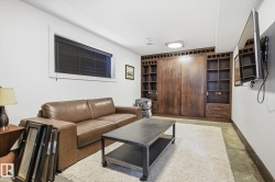 Living area featuring baseboards - 