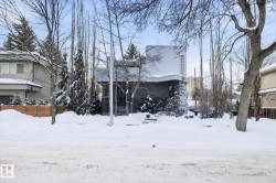 View of snow covered back of property - 
