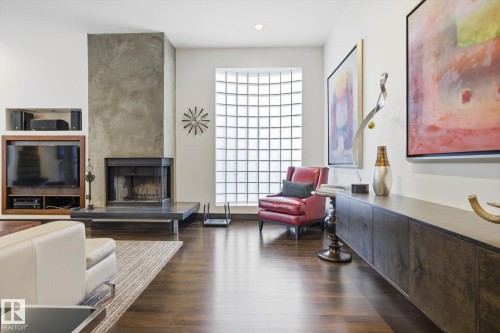 9012 98 Street, Edmonton, AB - Indoor Photo Showing Living Room With Fireplace
