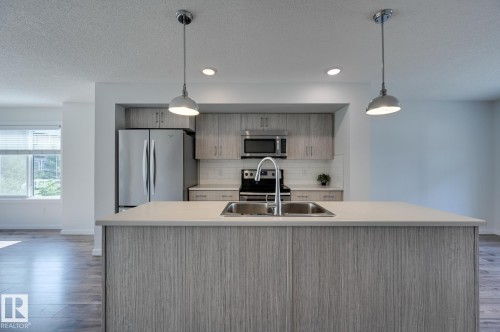 26 2215 24 Street, Edmonton, AB - Indoor Photo Showing Kitchen With Stainless Steel Kitchen With Double Sink With Upgraded Kitchen