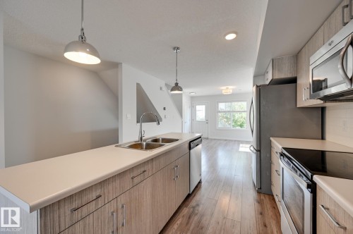 26 2215 24 Street, Edmonton, AB - Indoor Photo Showing Kitchen With Double Sink