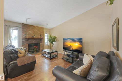 44 Lennox Drive, St. Albert, AB - Indoor Photo Showing Living Room With Fireplace