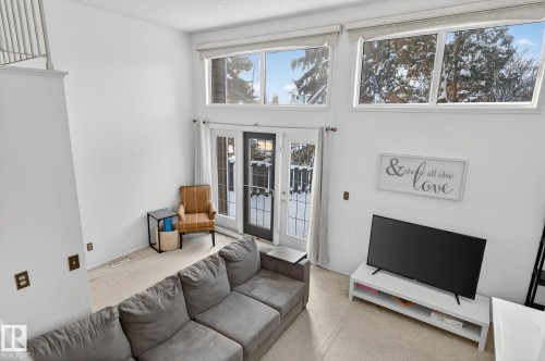 1037 Millbourne Rd E Nw, Edmonton, AB - Indoor Photo Showing Living Room
