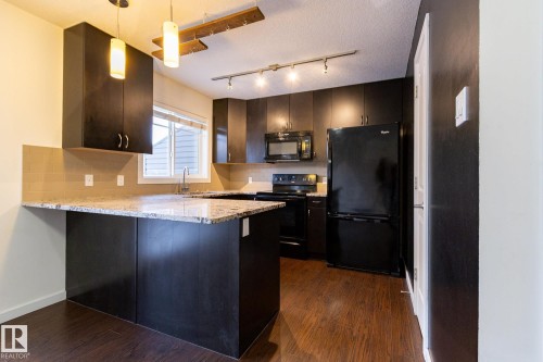 14 9515 160 Avenue, Edmonton, AB - Indoor Photo Showing Kitchen With Upgraded Kitchen