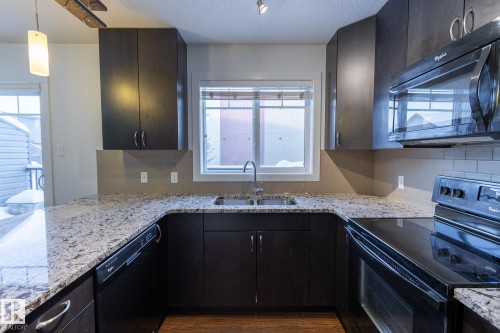 14 9515 160 Avenue, Edmonton, AB - Indoor Photo Showing Kitchen With Double Sink With Upgraded Kitchen