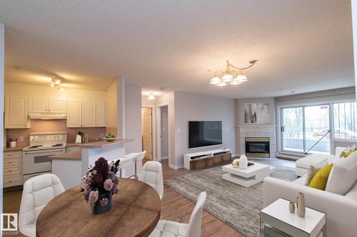 112 11716 100 Avenue, Edmonton, AB - Indoor With Fireplace