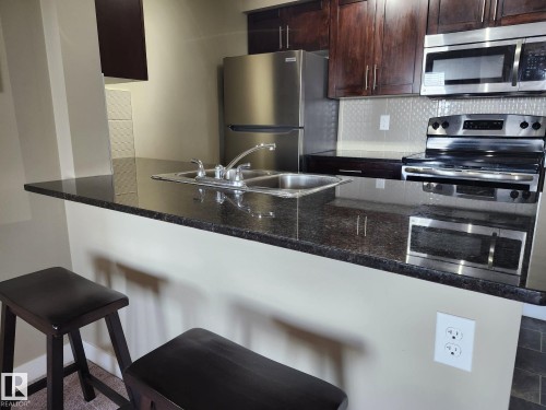 407 270 Mcconachie Drive, Edmonton, AB - Indoor Photo Showing Kitchen With Stainless Steel Kitchen With Double Sink With Upgraded Kitchen
