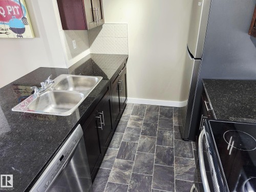 407 270 Mcconachie Drive, Edmonton, AB - Indoor Photo Showing Kitchen With Double Sink