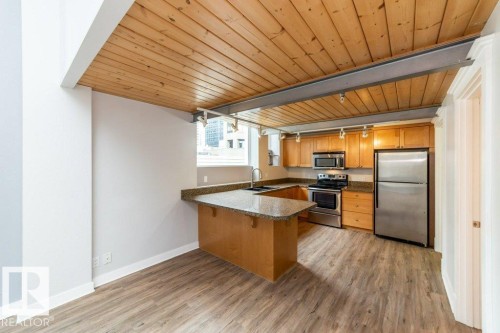 208 10009 102 Avenue, Edmonton, AB - Indoor Photo Showing Kitchen With Stainless Steel Kitchen With Double Sink