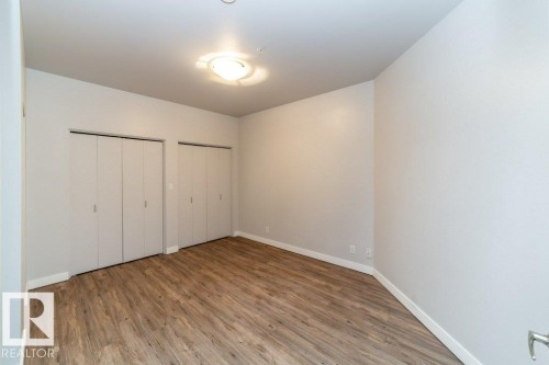 208 10009 102 Avenue, Edmonton, AB - Indoor Photo Showing Other Room