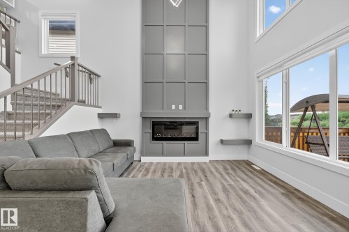 86 Meadowlink Common, Spruce Grove, AB - Indoor Photo Showing Living Room With Fireplace