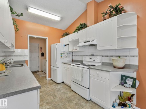 Edmonton, AB - Indoor Photo Showing Kitchen With Double Sink