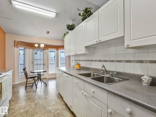 # 26 13320 124 Street Nw, Edmonton, AB - Indoor Photo Showing Kitchen With Double Sink