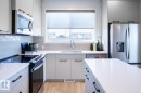 907 Rowan Way, Edmonton, AB  - Indoor Photo Showing Kitchen With Double Sink 
