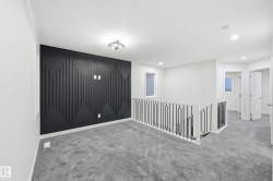Carpeted empty room featuring baseboards and recessed lighting - 