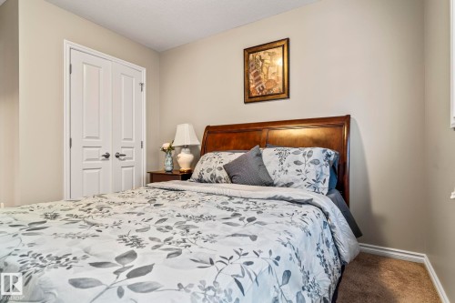Bedroom with carpet floors and a closet - 5734 175A Avenue, Edmonton, AB - Indoor Photo Showing Bedroom