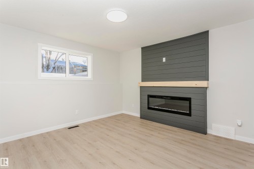 76 Dayton Crescent, St. Albert, AB - Indoor Photo Showing Living Room With Fireplace