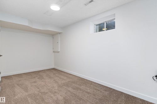 63 1033 Youville Drive W, Edmonton, AB - Indoor Photo Showing Other Room