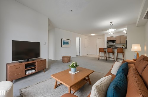 303 530 Watt Boulevard, Edmonton, AB - Indoor Photo Showing Living Room