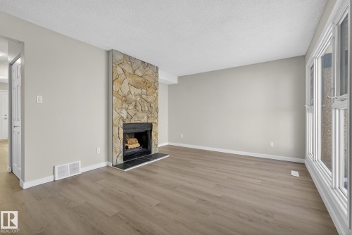 3205 142 Avenue, Edmonton, AB - Indoor Photo Showing Living Room With Fireplace