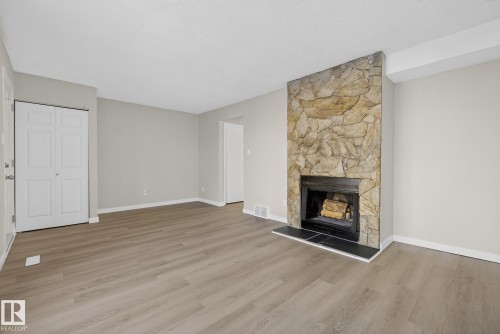 3205 142 Avenue, Edmonton, AB - Indoor Photo Showing Living Room With Fireplace