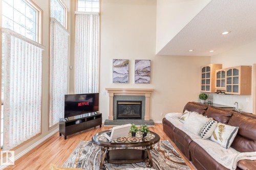 1135 116 Street, Edmonton, AB - Indoor Photo Showing Living Room With Fireplace