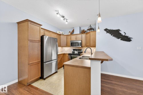 230 2503 Hanna Crescent, Edmonton, AB - Indoor Photo Showing Kitchen With Stainless Steel Kitchen