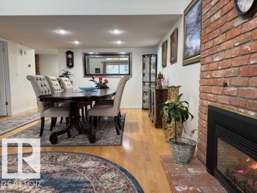 17607 55 Avenue, Edmonton, AB - Indoor Photo Showing Dining Room With Fireplace