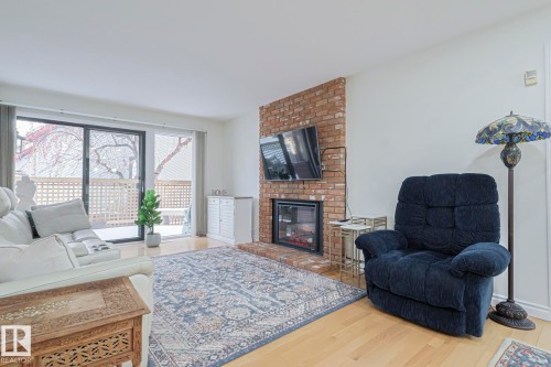 17607 55 Avenue, Edmonton, AB - Indoor Photo Showing Living Room With Fireplace