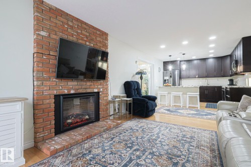 17607 55 Avenue, Edmonton, AB - Indoor Photo Showing Living Room With Fireplace
