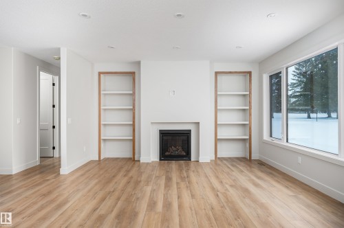 30 Grayson Green, Stony Plain, AB - Indoor Photo Showing Living Room With Fireplace