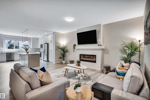 4930 Kinney Road, Edmonton, AB - Indoor Photo Showing Living Room With Fireplace
