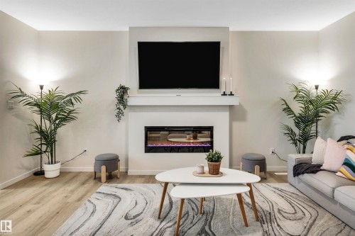 4930 Kinney Road, Edmonton, AB - Indoor Photo Showing Living Room With Fireplace