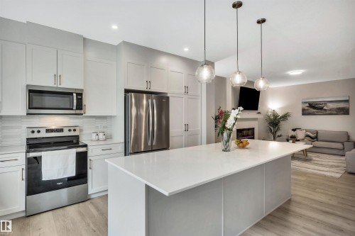 4930 Kinney Road, Edmonton, AB - Indoor Photo Showing Kitchen With Stainless Steel Kitchen With Upgraded Kitchen