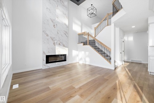 1713 Crossbill Loop Nw, Edmonton, AB - Indoor With Fireplace