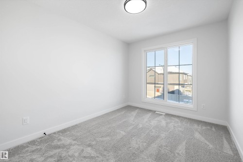 1713 Crossbill Loop Nw, Edmonton, AB - Indoor Photo Showing Other Room