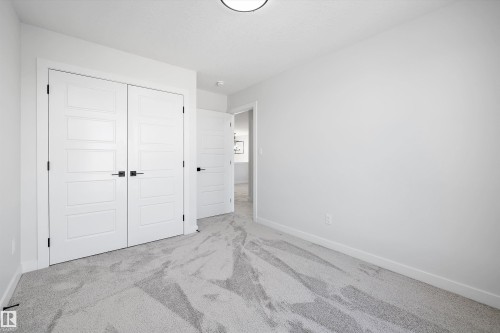 1713 Crossbill Loop Nw, Edmonton, AB - Indoor Photo Showing Other Room