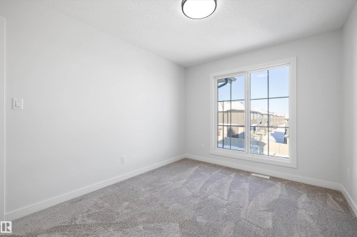 1713 Crossbill Loop Nw, Edmonton, AB - Indoor Photo Showing Other Room
