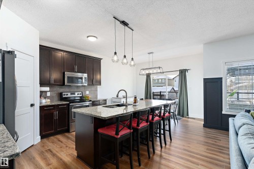 16 Sutherland Street, Leduc, AB - Indoor Photo Showing Kitchen With Upgraded Kitchen