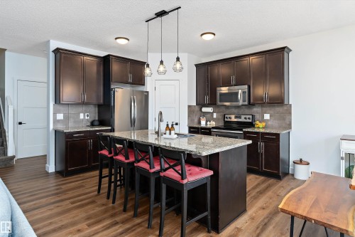 16 Sutherland Street, Leduc, AB - Indoor Photo Showing Kitchen With Upgraded Kitchen