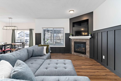 16 Sutherland Street, Leduc, AB - Indoor Photo Showing Living Room With Fireplace