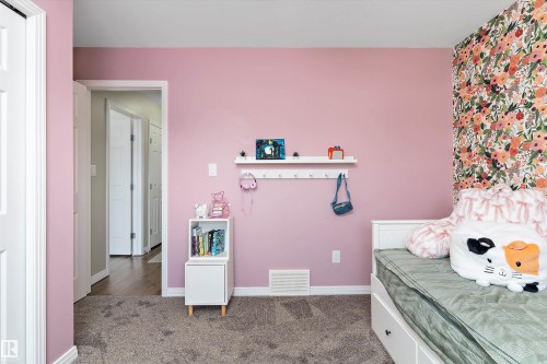 16 Sutherland Street, Leduc, AB - Indoor Photo Showing Bedroom