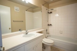 Full bath with vanity and shower / tub combination - 