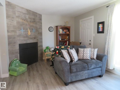 3103 109 Street, Edmonton, AB - Indoor Photo Showing Living Room With Fireplace